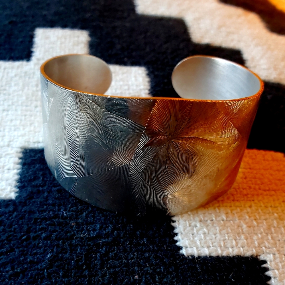 Silver colored cuff bracelet